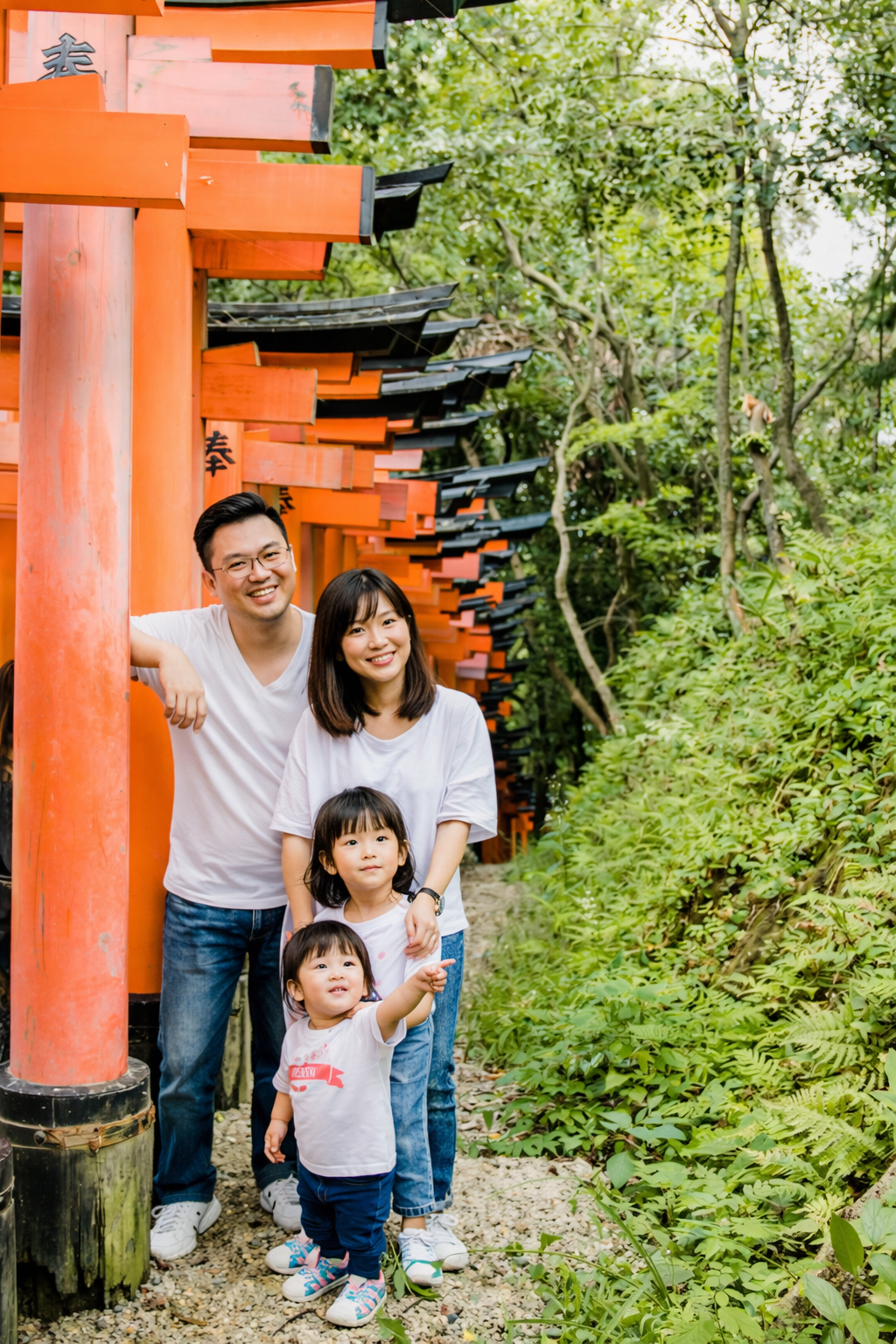 A family enjoying their time at Fushimi Inari Taisha