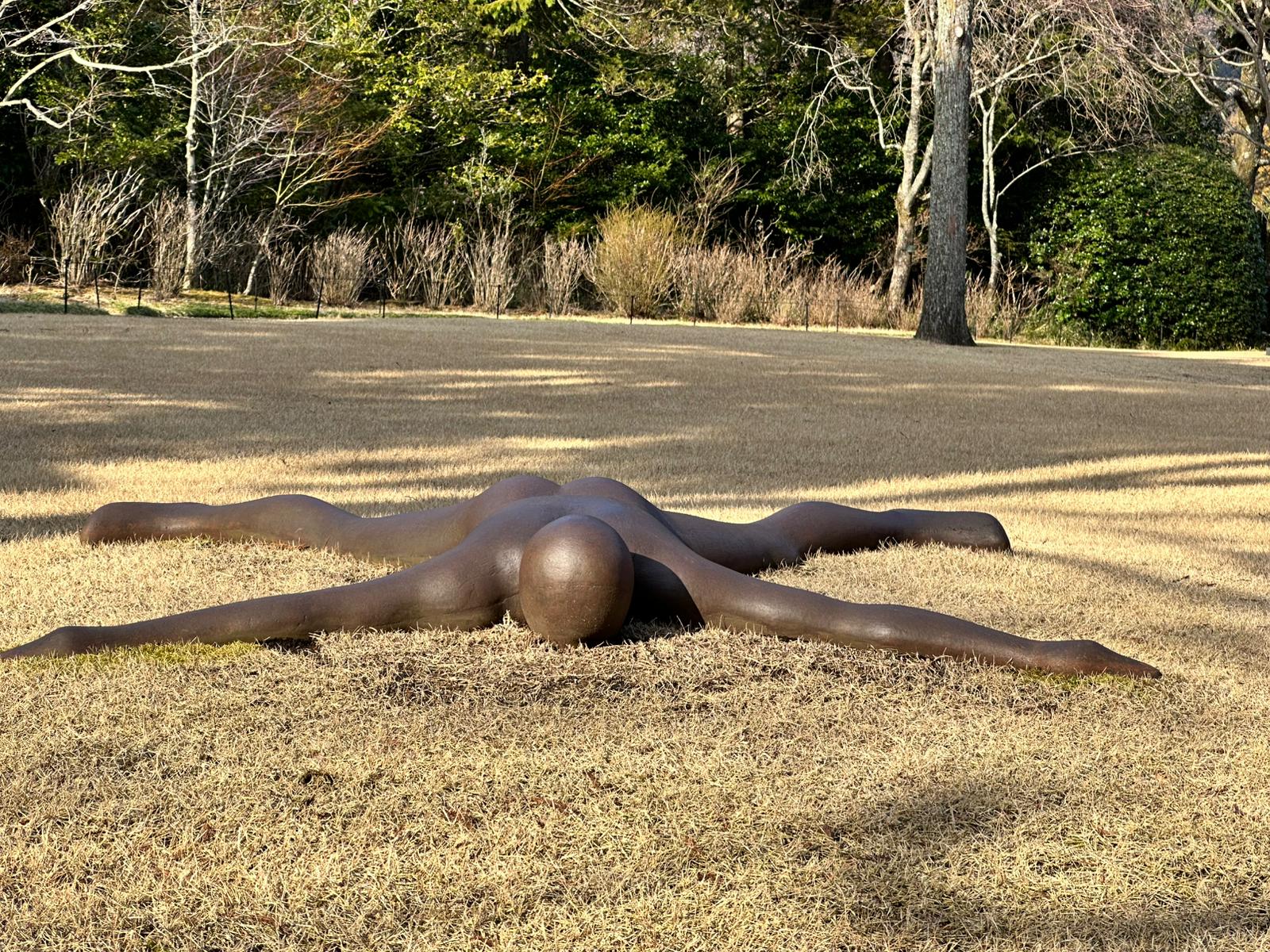 Lying Man Sculpture