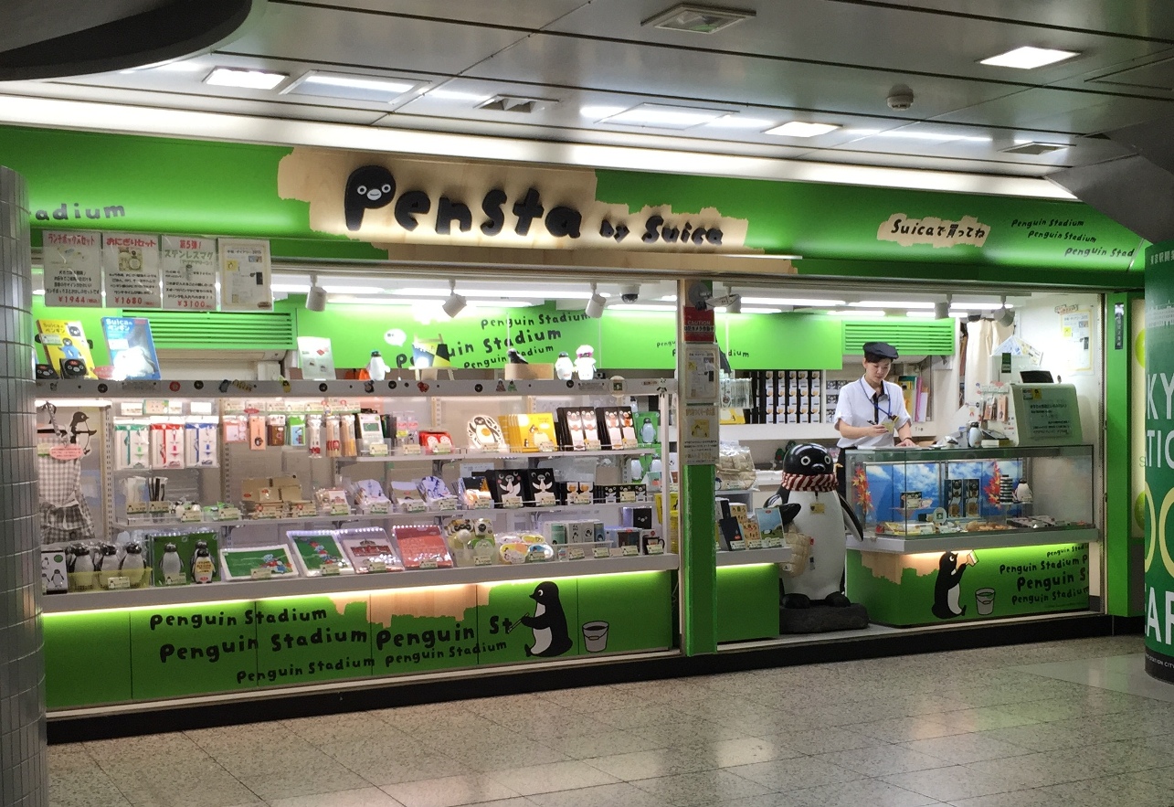 Suica Penguin merchandise including stationery and bags