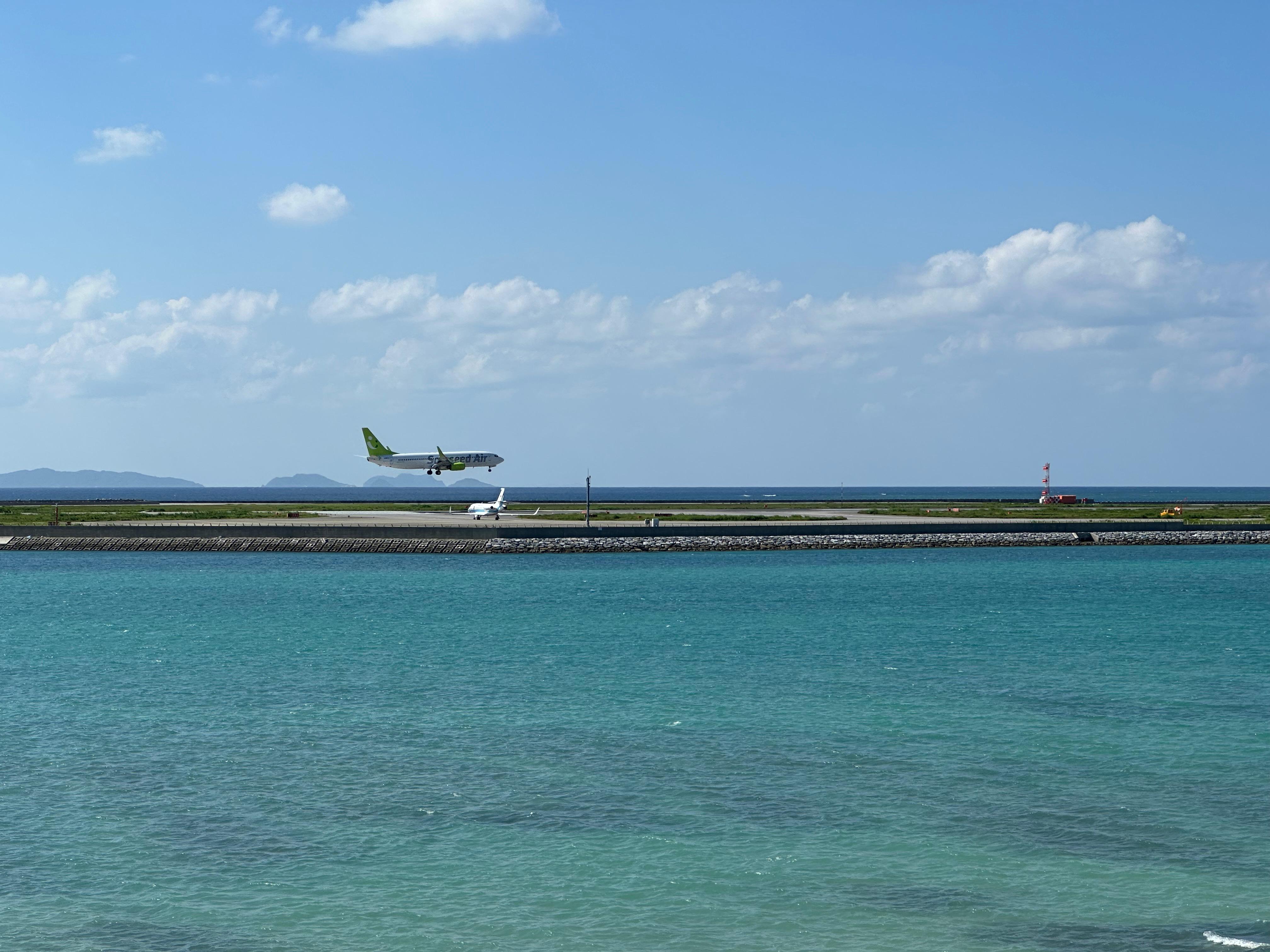 Solaseed Air plane landing over the sea