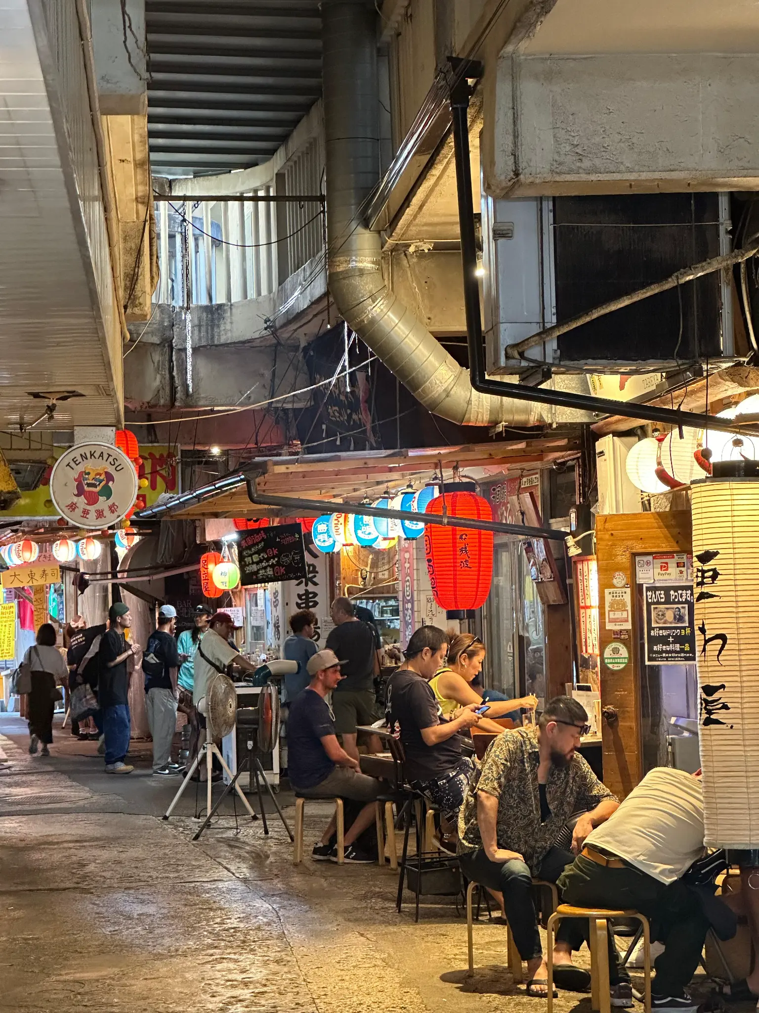 Kokusai-dori Yatai Mura alley with people dining